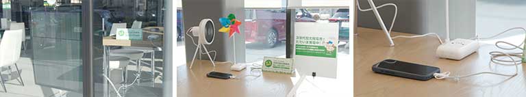 軽さを生かし、ガラス面へ設置。 / 発電した電力はスマホ充電など、来店したお客さまが実際に使用可能。